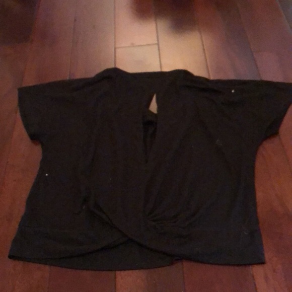 Black old navy cropped T kids 10-12. It has a small stain on the bottom corner - Picture 2 of 2